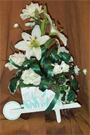 keepsake arrangement with white lilys, carnations and baby's breath