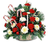 Holiday candy cane basket arrangement with xmas greens, pine cones, red carnations, white mums and xmas decorations.
